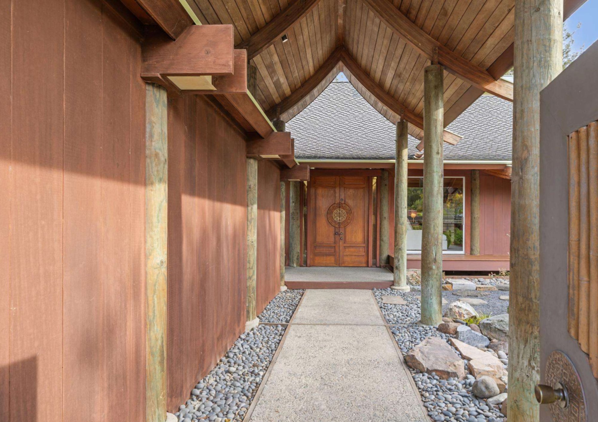 293 Elysian Fields Drive — Entry approach with hand-carved doors and natural log columns