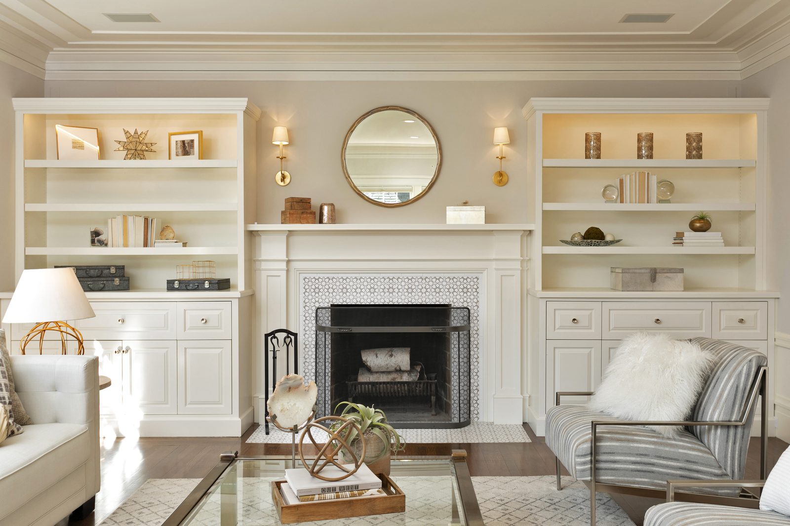 Classic Piedmont living room with white built-ins and a traditional fireplace